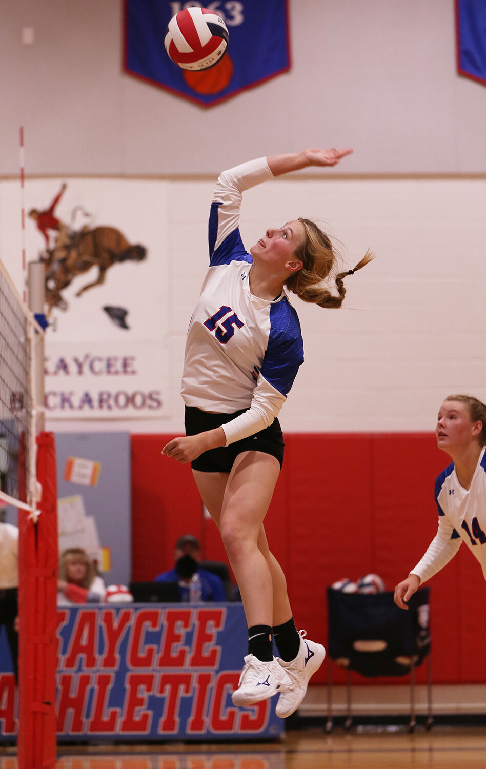 Tinley Pierson spikes the ball during the fourth and final set